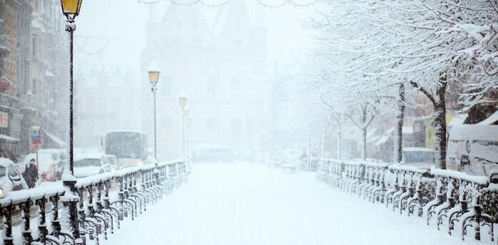 Snow covered street during winter storm