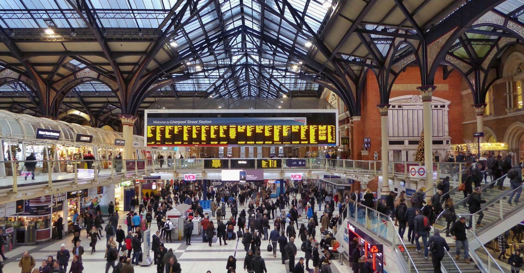 Crowded airport terminal with passengers during holiday travel period