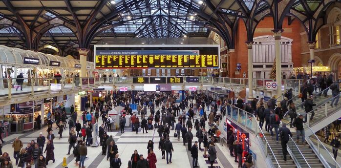 Crowded airport terminal with passengers during holiday travel period