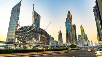 Dubai skyline with Museum of the Future and Sheikh Zayed Road traffic