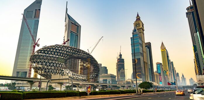 Dubai skyline with Museum of the Future and Sheikh Zayed Road traffic