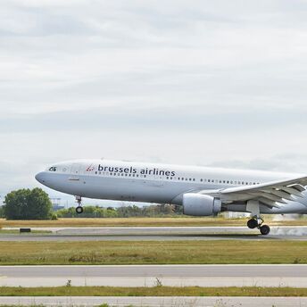 Brussels Airlines aircraft landing at Brussels Airport runway