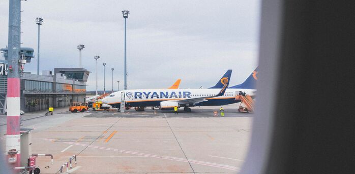 Ryanair aircraft parked at airport stand