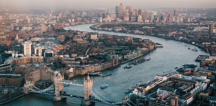 Aerial view of central London with the River Thames and Tower Bridge