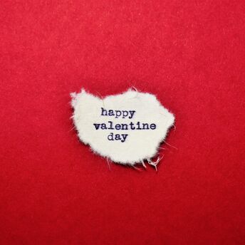 Happy Valentine’s Day message on red background