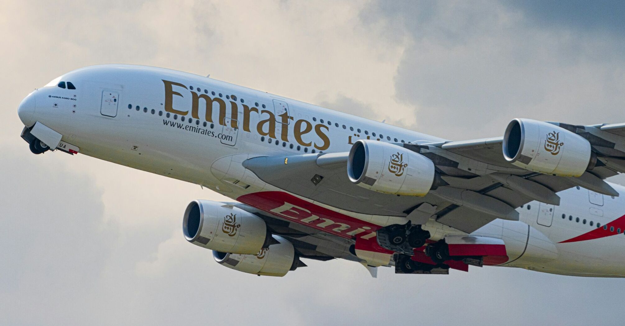 Emirates aircraft departing on long-haul service