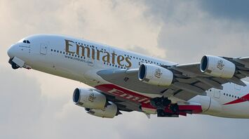 Emirates aircraft departing on long-haul service