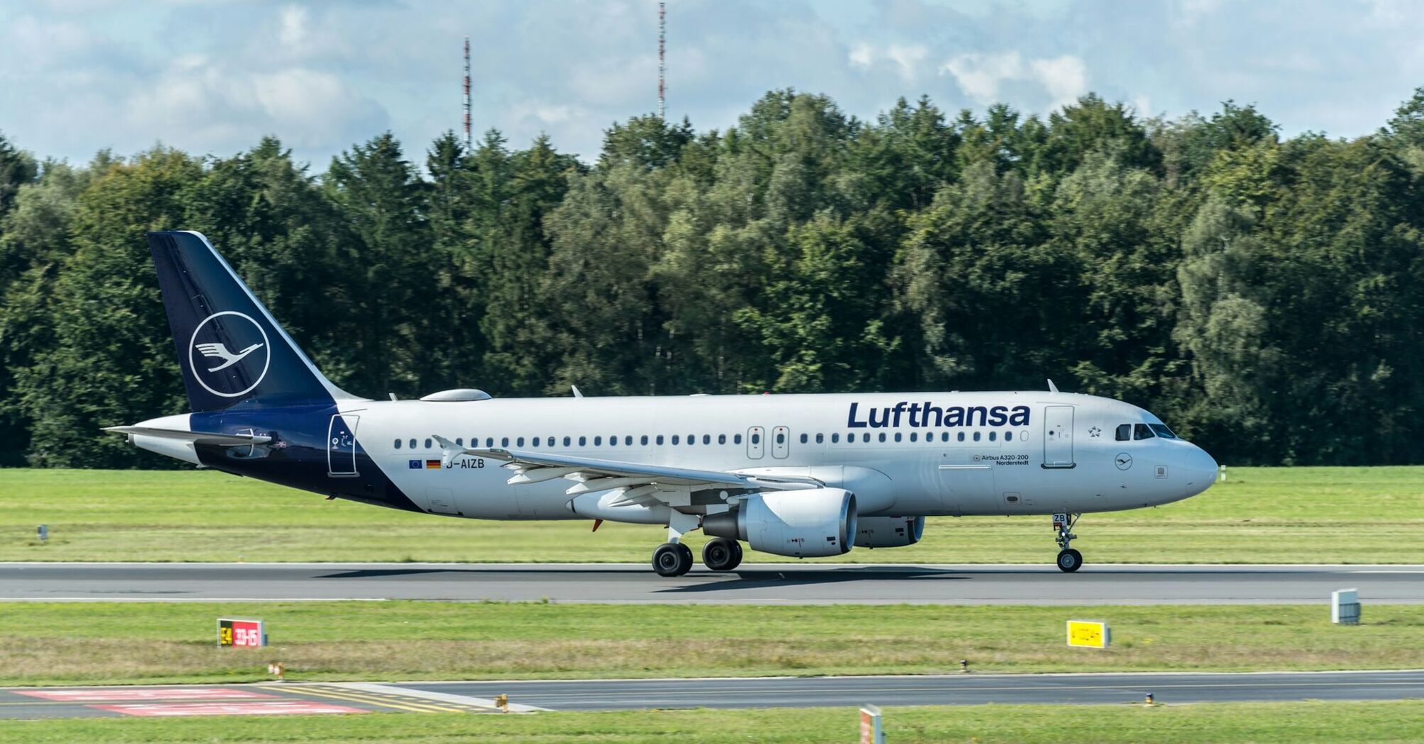 Lufthansa aircraft taxiing at an airport
