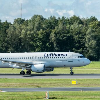 Lufthansa aircraft taxiing at an airport