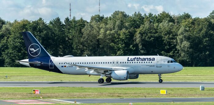 Lufthansa aircraft taxiing at an airport