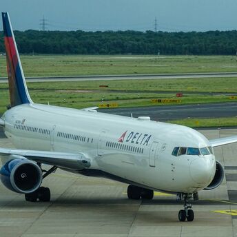 Delta Air Lines aircraft on airport runway