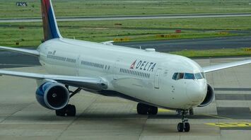 Delta Air Lines aircraft on airport runway