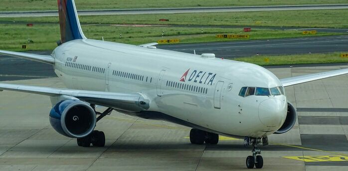 Delta Air Lines aircraft on airport runway