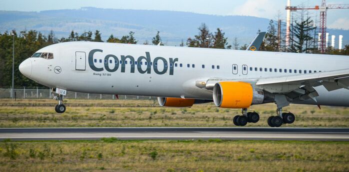 Condor Boeing 767 aircraft landing on runway