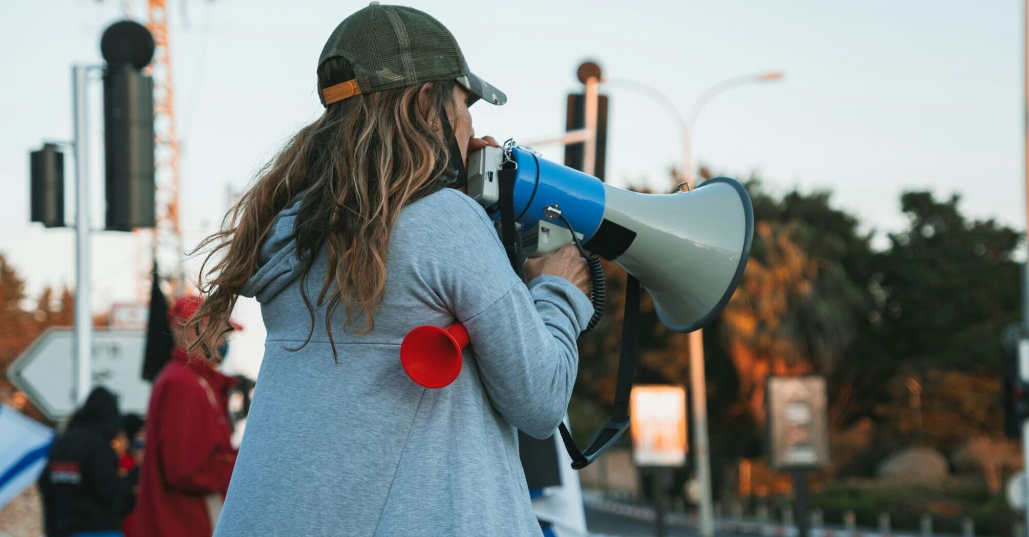 Protester speaking through megaphone during strike