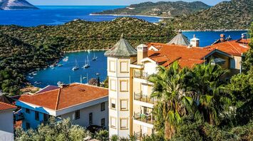 Coastal view of Antalya with boats and hillside houses
