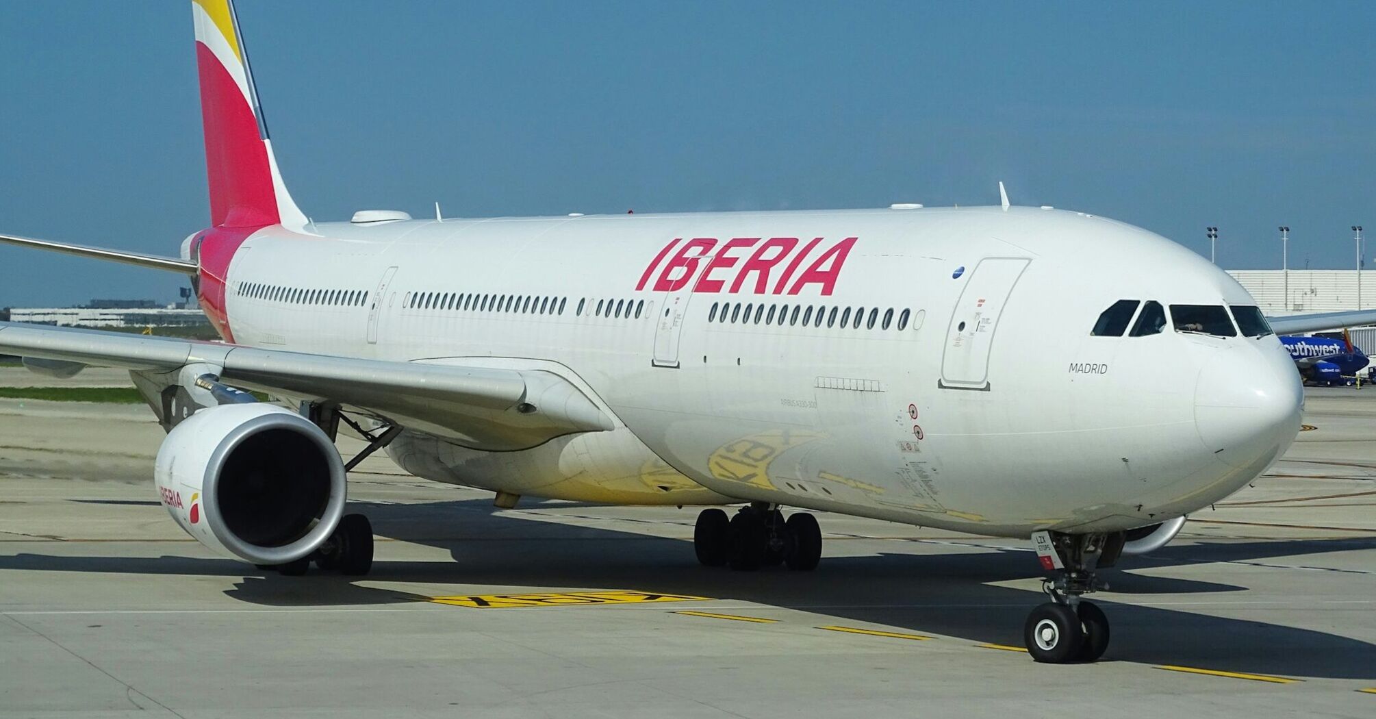 Iberia long-haul aircraft on airport apron