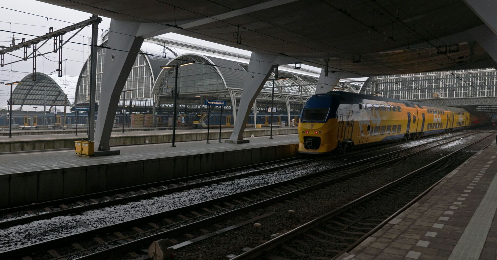 Dutch double-decker train at modern station platform