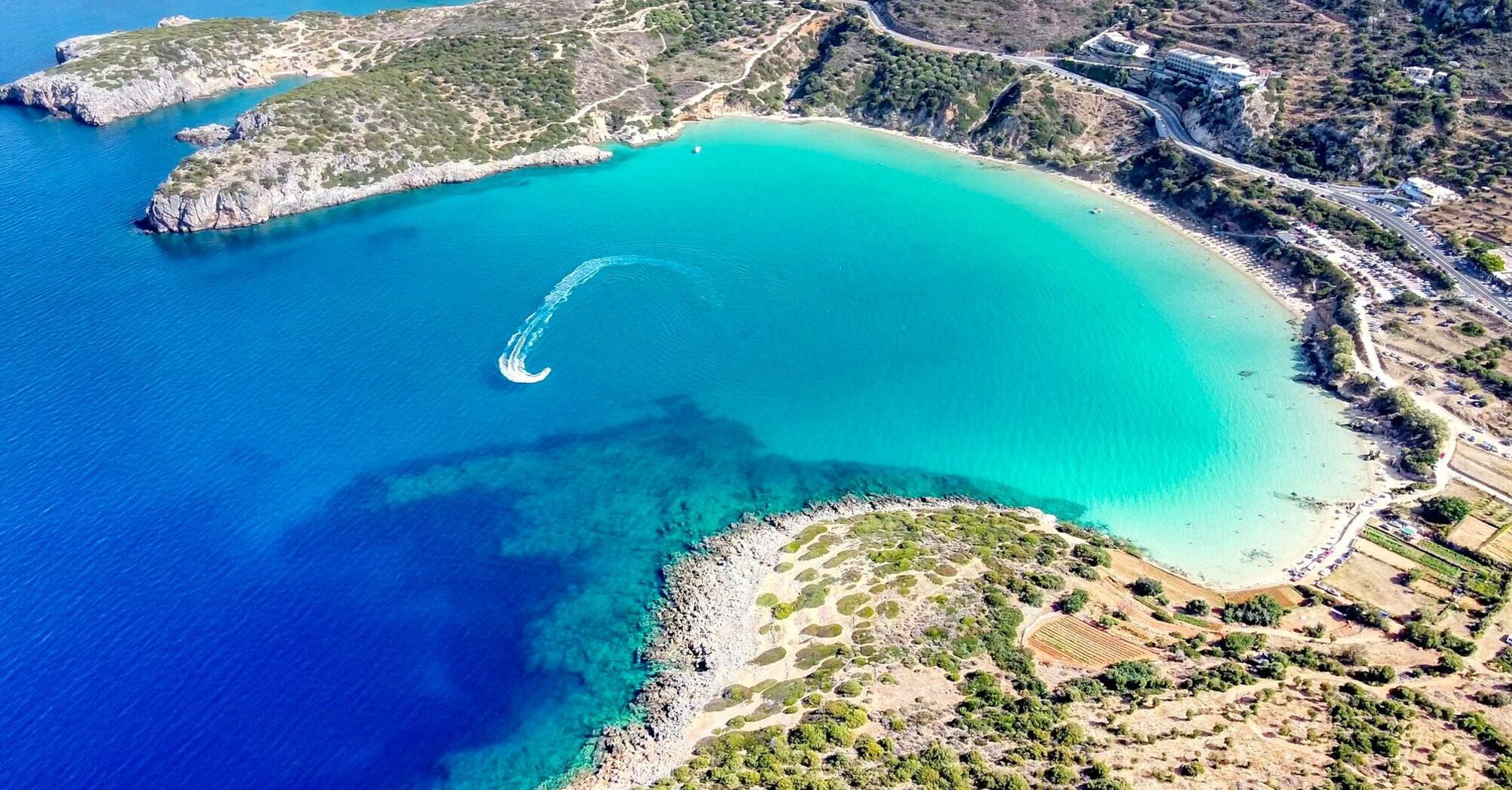 Aerial view of turquoise bay on Greek island coastline