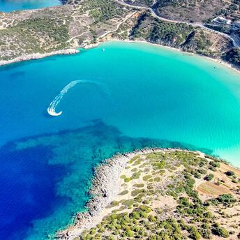 Aerial view of turquoise bay on Greek island coastline