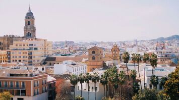 Málaga skyline with cathedral and palm trees