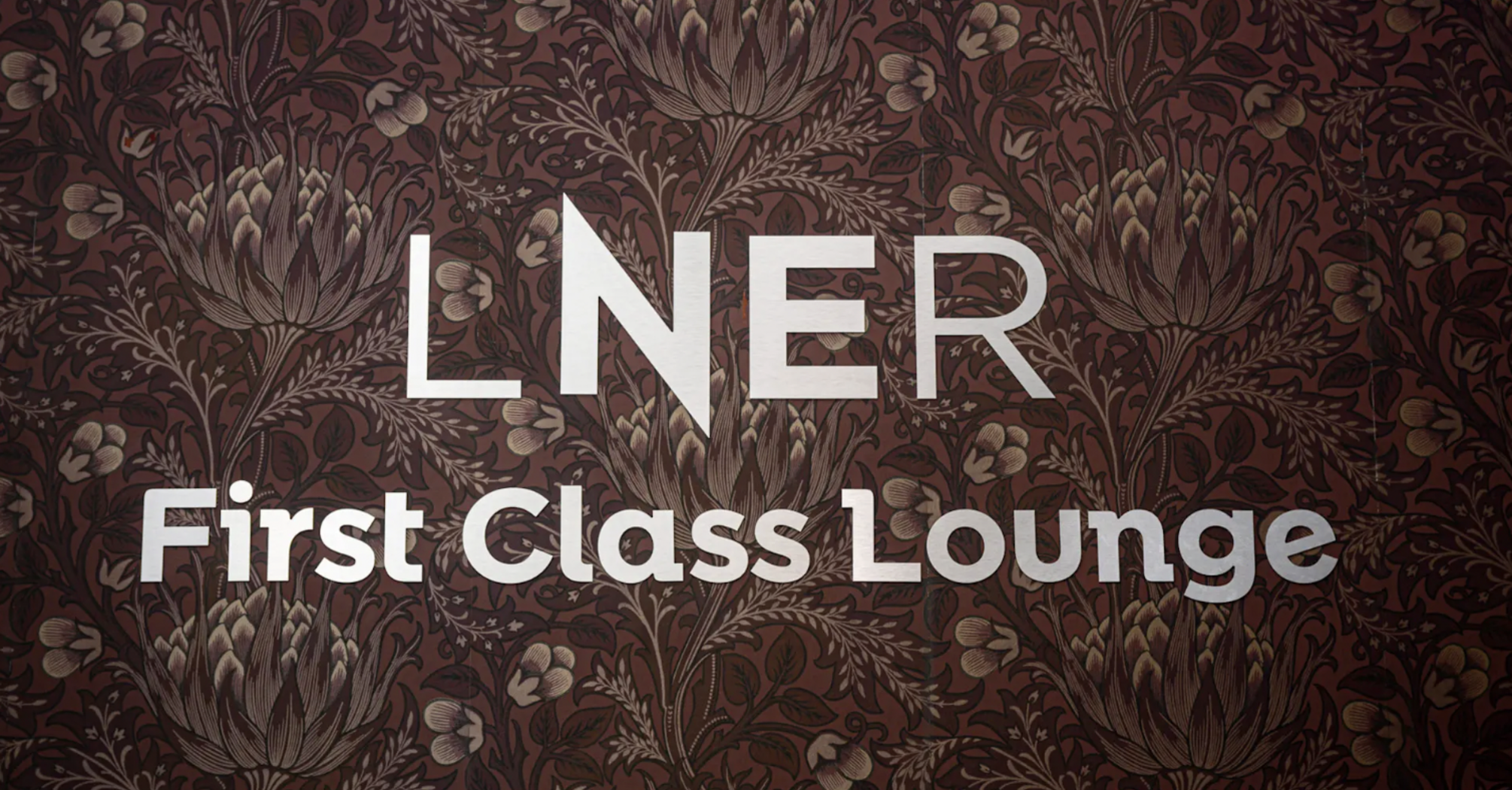 LNER First Class Lounge sign on patterned wall