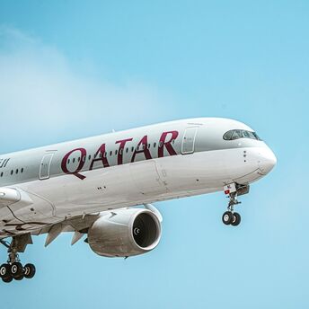 Qatar Airways aircraft descending for landing