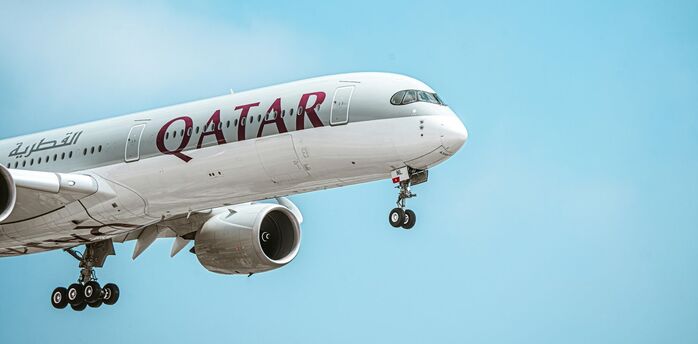 Qatar Airways aircraft descending for landing