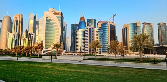 Modern skyline of central Doha with glass towers