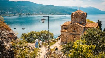 Church overlooking Lake Ohrid with mountains in background