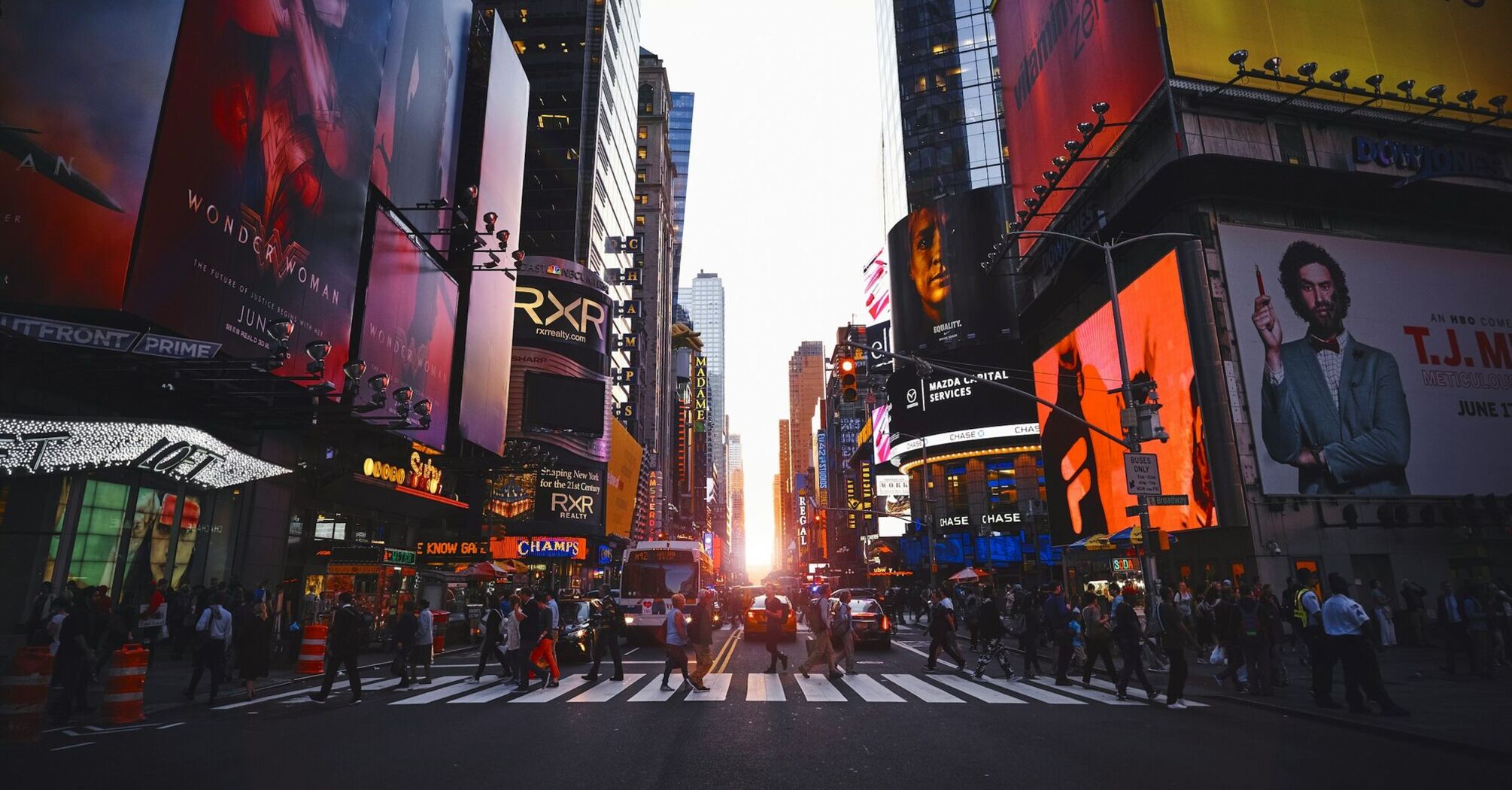 Times Square street scene with bright digital billboards