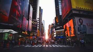 Times Square street scene with bright digital billboards