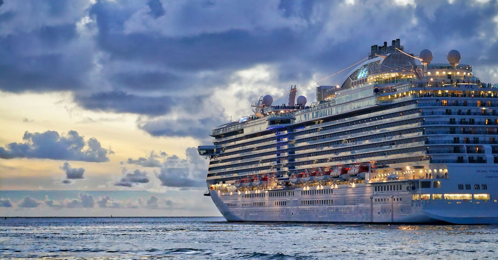 Large cruise ship at sea during evening light