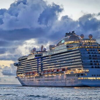 Large cruise ship at sea during evening light