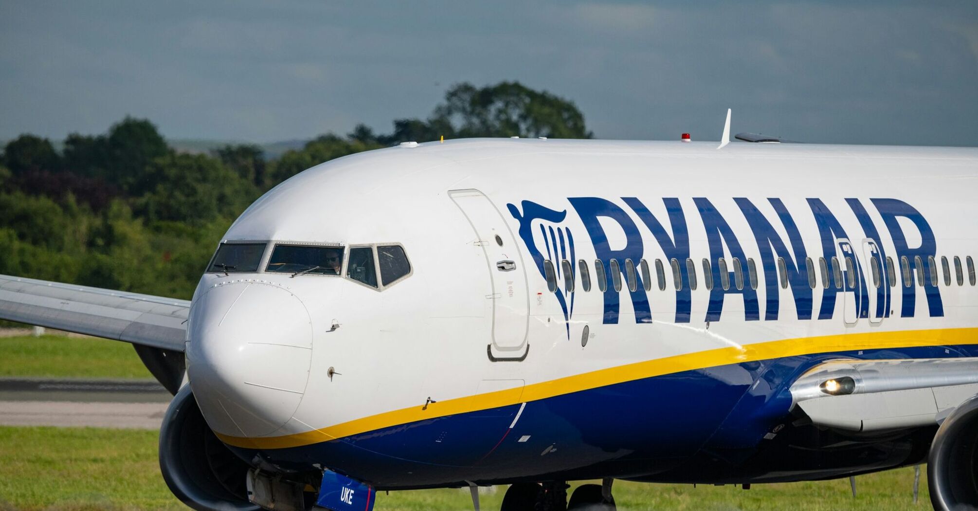 Ryanair aircraft on runway with airline logo visible
