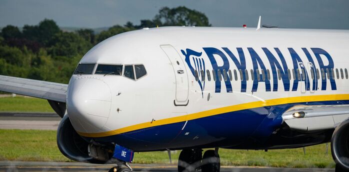 Ryanair aircraft on runway with airline logo visible