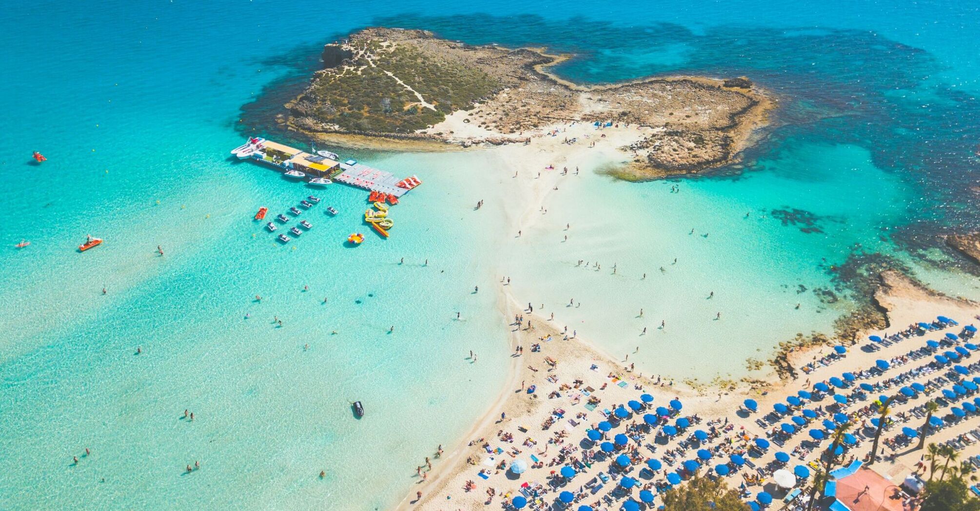 Aerial view of Nissi Beach and small island in Ayia Napa, Cyprus