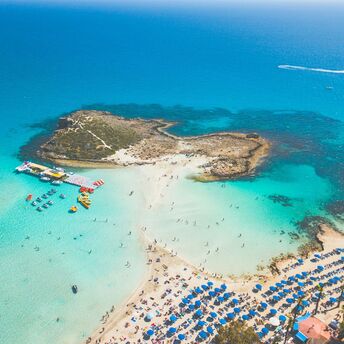 Aerial view of Nissi Beach and small island in Ayia Napa, Cyprus