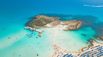 Aerial view of Nissi Beach and small island in Ayia Napa, Cyprus