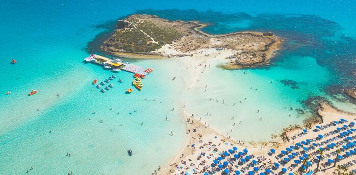 Aerial view of Nissi Beach and small island in Ayia Napa, Cyprus