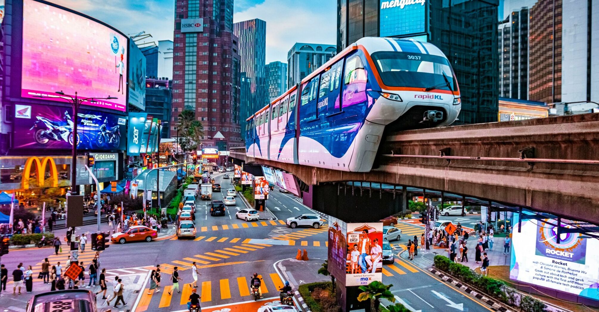Kuala Lumpur city centre with Rapid KL monorail and busy intersection