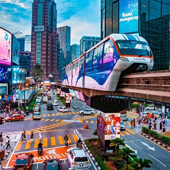 Kuala Lumpur city centre with Rapid KL monorail and busy intersection