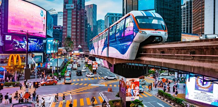 Kuala Lumpur city centre with Rapid KL monorail and busy intersection
