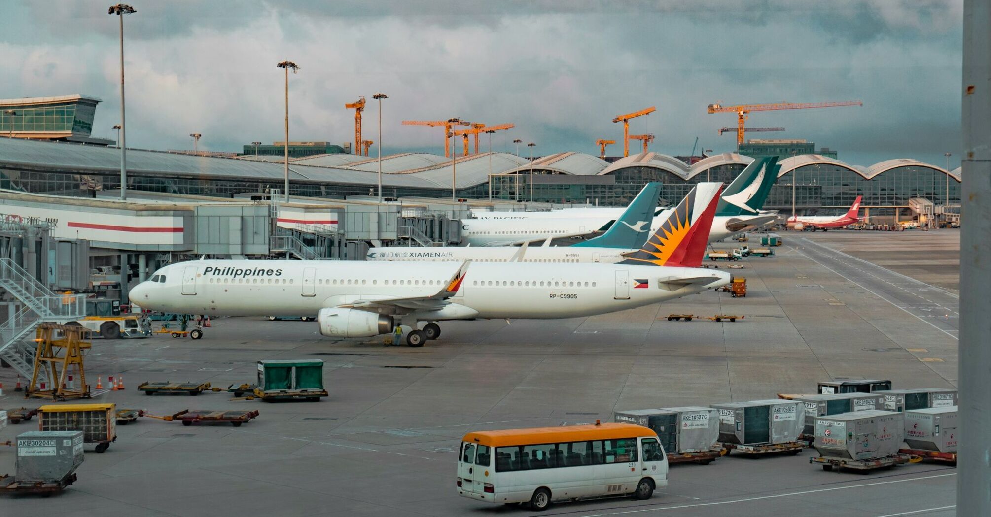 Philippine Airlines aircraft parked at an airport gate
