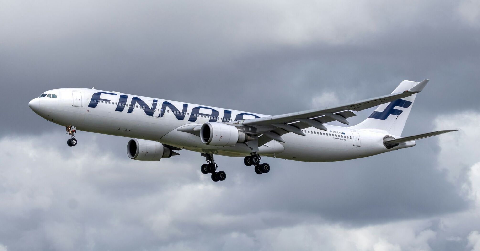 Finnair Airbus A330 aircraft approaching runway during landing