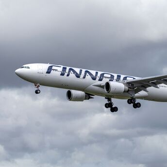 Finnair Airbus A330 aircraft approaching runway during landing