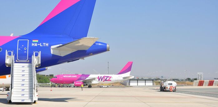 Wizz Air aircraft parked on airport apron