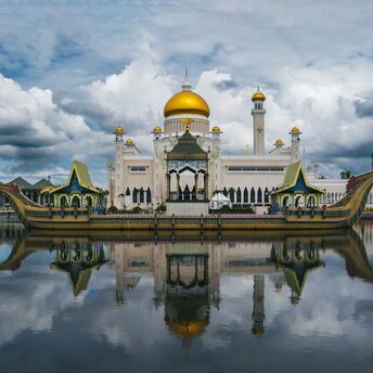 Sultan Omar Ali Saifuddien Mosque reflected in lagoon in Brunei