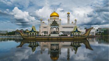 Sultan Omar Ali Saifuddien Mosque reflected in lagoon in Brunei