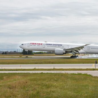 China Eastern widebody aircraft landing on airport runway